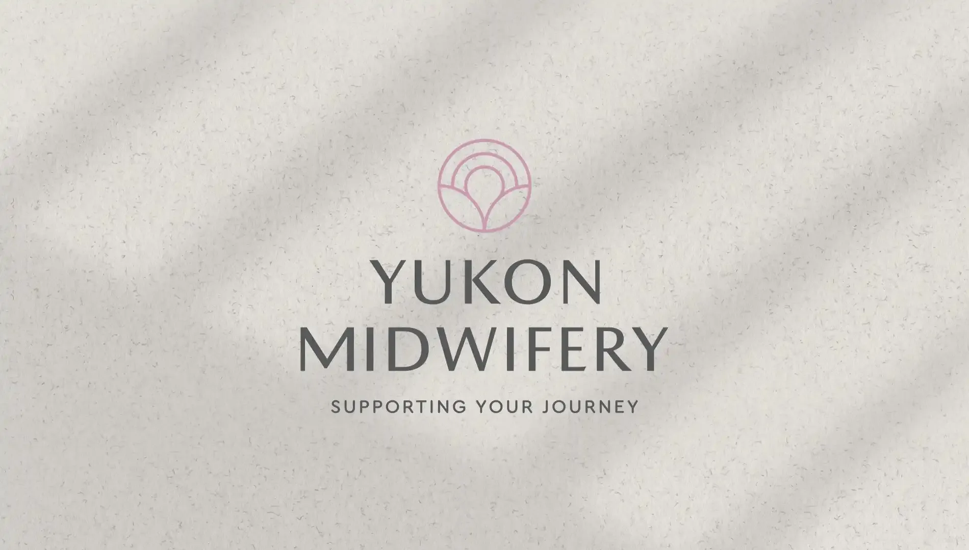 The Yukon Midwifery Program logo designed by MBDC, with stylized text and gentle, supportive imagery.